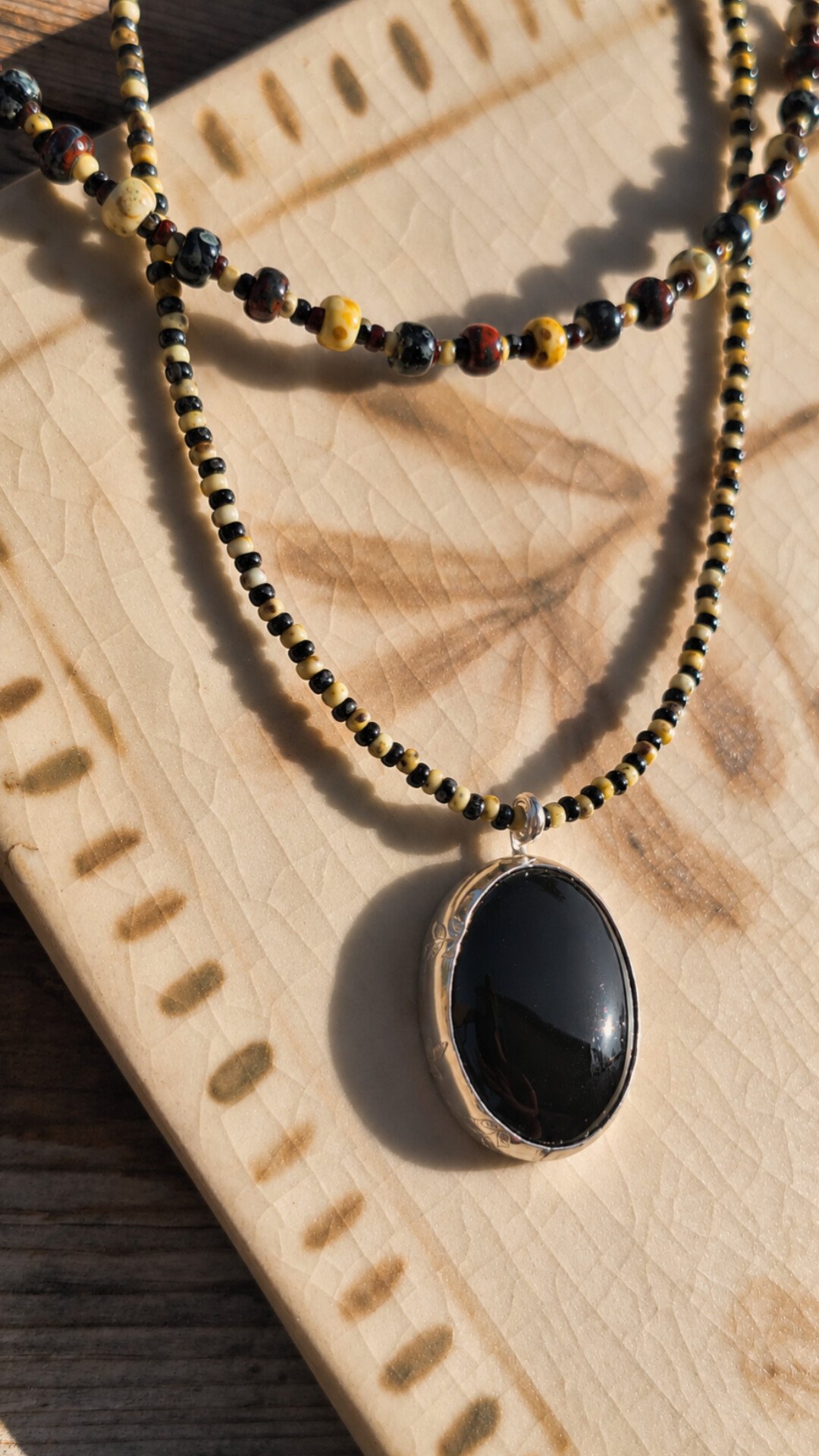 Colgante doble Onyx